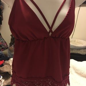 Maroon low cut sleeveless satin top